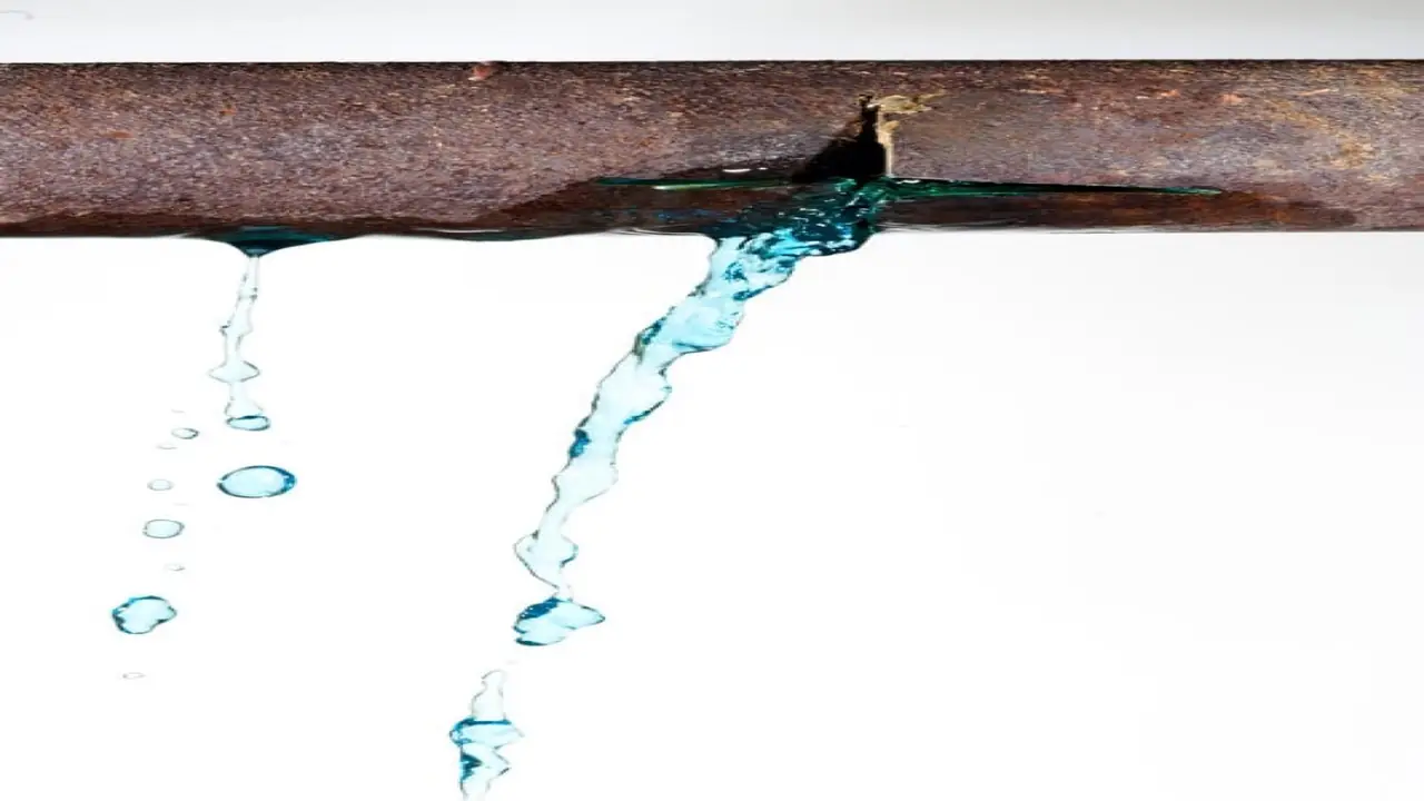 Illustration of water escaping from a split pipe